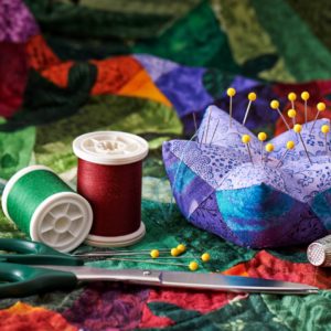 Accessories for sewing Detail of the quilt with accessories for sewing